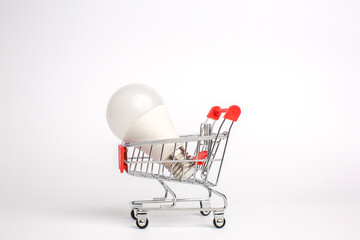 LED light bulbs on a cart, Isolated on white background. The concept of selling and buying business...