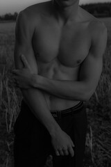 portrait of a man,  muscular man, young man, body,muscle,shirtless,model man,black and white photo