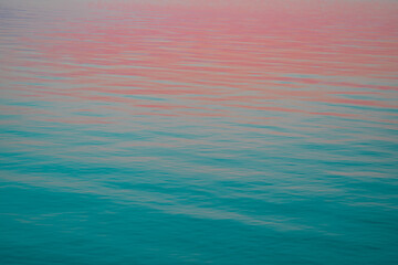 Hues of color on water during sunset in Ottawa, Ontario