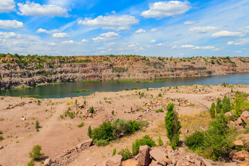 View of the lake at abandoned quarry on summer