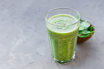 Healthy green smoothie with spinach in a glass mug, drink banner