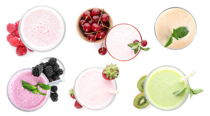 Set of different tasty milk shakes on white background, top view. Banner design