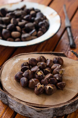 Roasted Chestnuts on Wooden Board