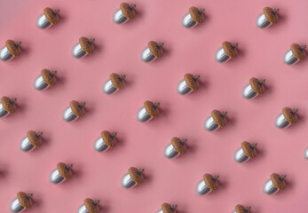 silver acorns on pink background pattern