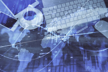 Double exposure of forex chart hologram over desktop with phone. Top view. Mobile trade platform concept.