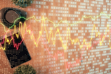 Multi exposure of financial chart hologram over desktop with phone. Top view. Mobile trade platform...
