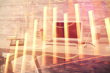 Double exposure of financial graph drawing and office interior background. Concept of stock market.