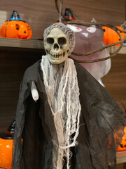 Vertical photo of scary death skeleton Halloween costume 
