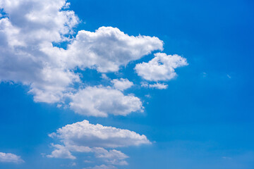 Beautiful photo of cumulus white clouds on blue sky