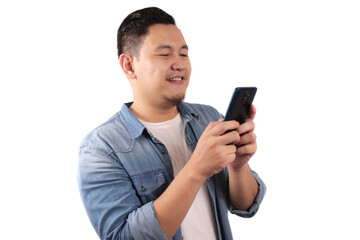 Handsome young Asian man with funny face playing games on tablet smart phone