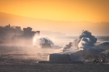 Sea storm hitting the basque coast at the break water of Donibane Lohizune (Saint Jean de Luz);...