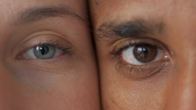 Black man and white woman's eyes.Interracial race love concept. Anti-racism. 