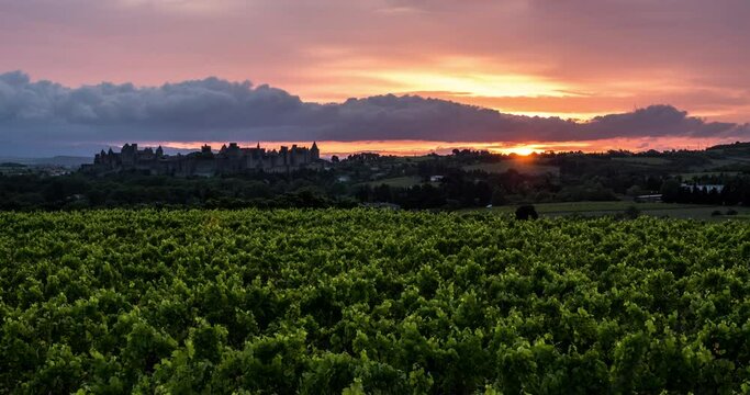 Beautiful timelapse of the Carcassonne City with a sunset, sunrise timelapse in Carcassonne in the vineyard, sunset timelapse with cloud, Timelapse with Cathar castles