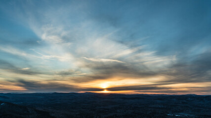 Beautiful sky at sunset in the mountains background texture
