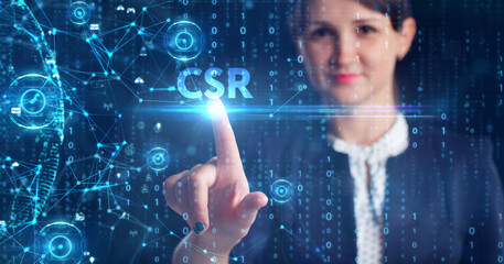 Business, Technology, Internet and network concept. Young businessman working on a virtual screen of the future and sees the inscription: CSR