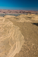 Swirling Patterns In Sandstone Rim at The Lunar Like  Landscape of Moonscape Overlook, Near Hanksville, Utah, USA
