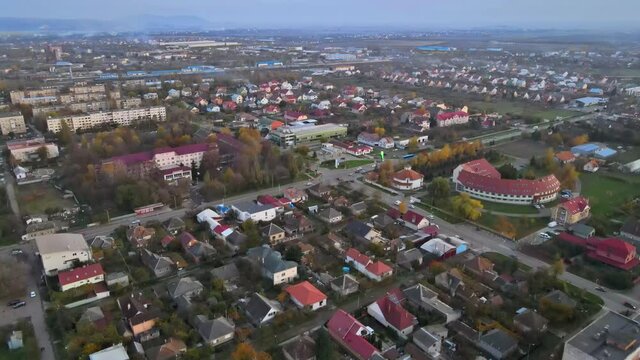 Morning idyllic sunrise bright horizon on Uzhgorod old city landscape with houses roofs in Zakarpattya Ukraine