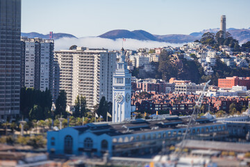 Aerial vibrant view of San Francisco port, with clock tower and the Ferry Building Marketplace, California, United States, seen from Bay Bridge