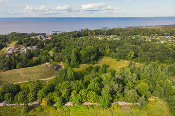 Fototapeta na wymiar Aerial summer view of West Kotlin state nature reserve, ecological path trail with bird watching tower, Kotlin island, Kronstadt, Saint-Peterburg, Russia