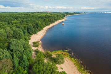Fototapeta premium Aerial summer view of West Kotlin state nature reserve, ecological path trail with bird watching tower, Kotlin island, Kronstadt, Saint-Peterburg, Russia