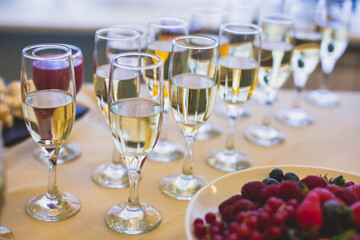 Beautifully decorated catering banquet table with different food snacks and appetizers on corporate christmas birthday party event or wedding celebration