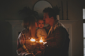 Family Celebrating at Home with Sparklers