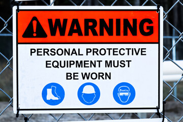 A Warning Personal Proctective Equipement Must Be Worn sign
