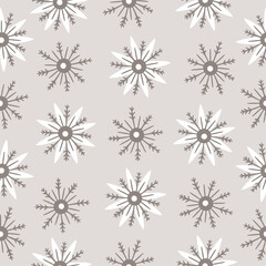 Seamless pattern with hand drawn snowflakes on a beige background. Doodle, simple illustration. It can be used for decoration of textile, paper and other surfaces.