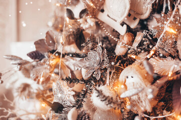 Christmas background with Christmas decorations in a soft gold style