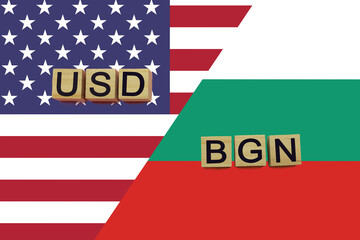 American and Bulgarian currencies codes on national flags background