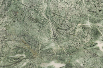 The surface texture is green with yellow streaks of marble. Abstract background for Wallpaper, print