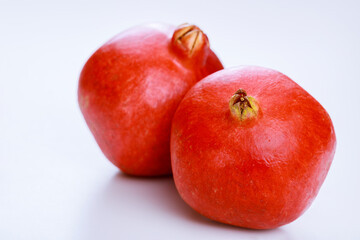Fresh pomegranate isolated on white background.