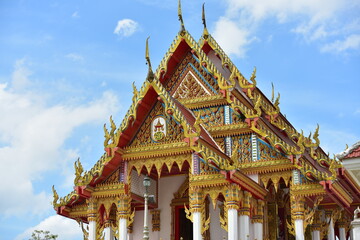 Golden statue of buddha in temple, Thailand