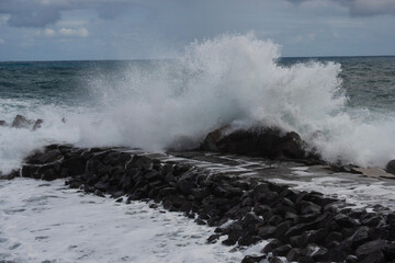 wave breaking on the rocks