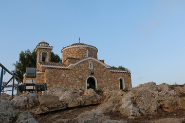 Obraz premium Republic of Cyprus. Prophet Elijah Church. Protaras. St. Elijah's Church. Tourist attraction of Protaras. holidays in Cyprus. Steps lead to the temple.