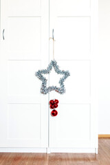 star and balls are red home decor rooting for new year and Christmas, background, shiny