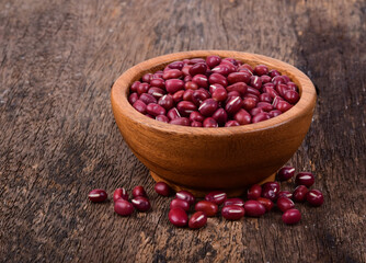 Red beans in wood bowl on wooden