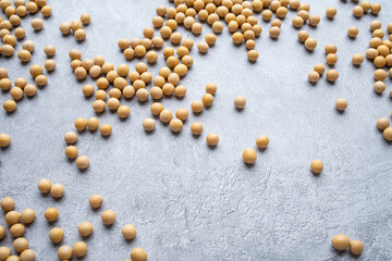 Soybeans are scattered on the cement shading