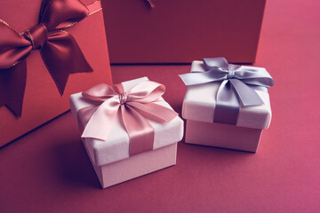 Exquisite gift box on red background