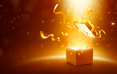 Ribbons and confetti bursting out from gold open gift box over sparkling light effect background
