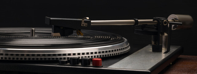 background of old retro vinyl record player, close-up, long photo