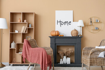 Interior of modern living room with fireplace and wicker armchairs