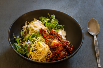 Korean food, Kkomag Bibimbab which is mixed with rice, vegetables and blood cockle