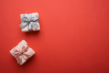 Exquisite gift box on red background