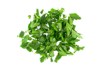 Fresh green chopped parsley leaves isolated on white background. Spicy aromatic sliced raw herbs of garden parsley.