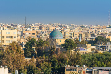 Aerial view of residential building skyline with blue tome of Lonban Mosque of Isfahan of Iran, one...