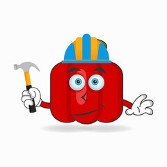 The Red paprika mascot character becomes a builder. vector illustration