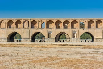 Photo sur Plexiglas Pont Khadjou Archs of Allahverdi Khan Bridge, also named  Si-o-seh pol bridge, across the Zayanderud river, in Isfahan, Iran, a famous historic building in Persian History