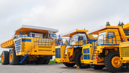 The worlds biggest truck with electric drive system consisting of four electric motors. Mining two-axle all-wheel-drive dump truck with weight-carrying capacity of 450 metric tons. 