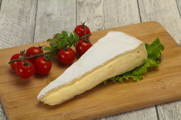 Brie cheese triangle served salad
